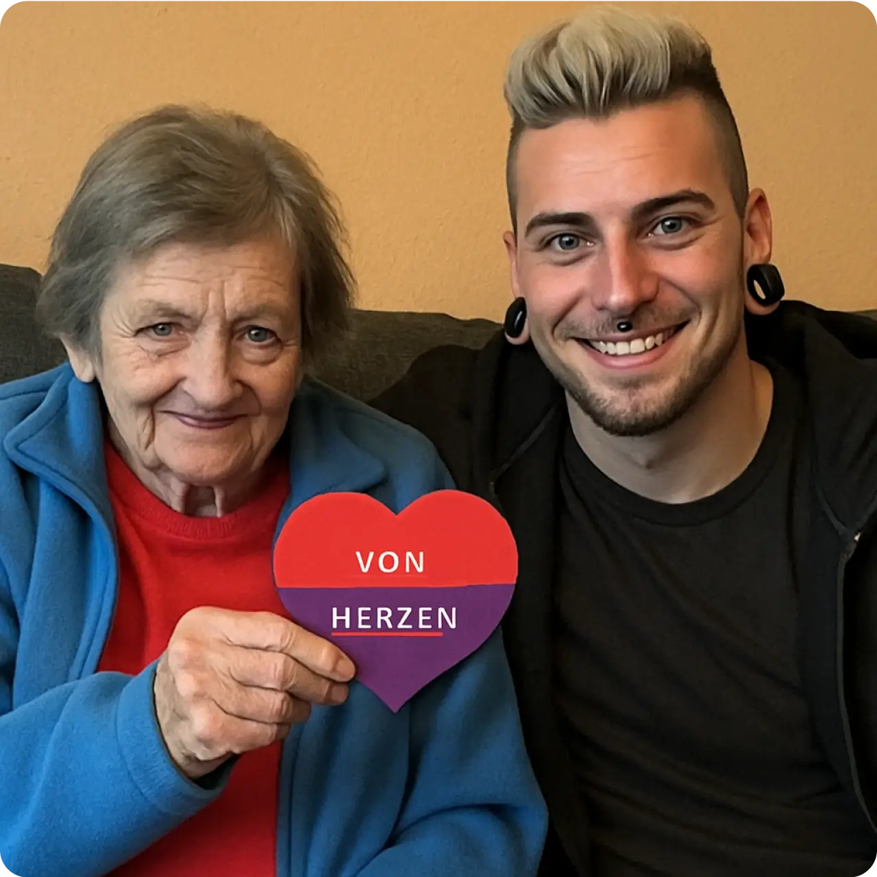Seniorin und Pflegekraft halten "Von Herzen" Schild - HÖHER Akademie Pflegeausbildung