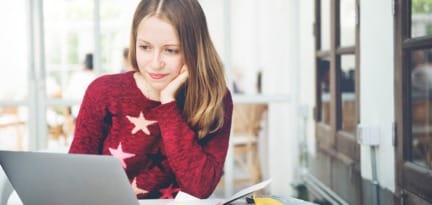 students woman studying online browsing e PHV28TX